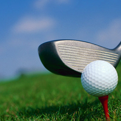 Close-up of Golf Club and Golf Ball