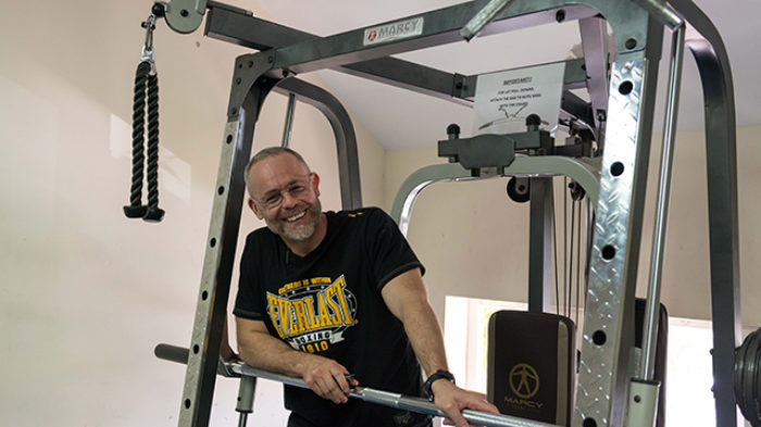 Kairos support worker Vincent Mahe with the new multigym at Linden Grove.